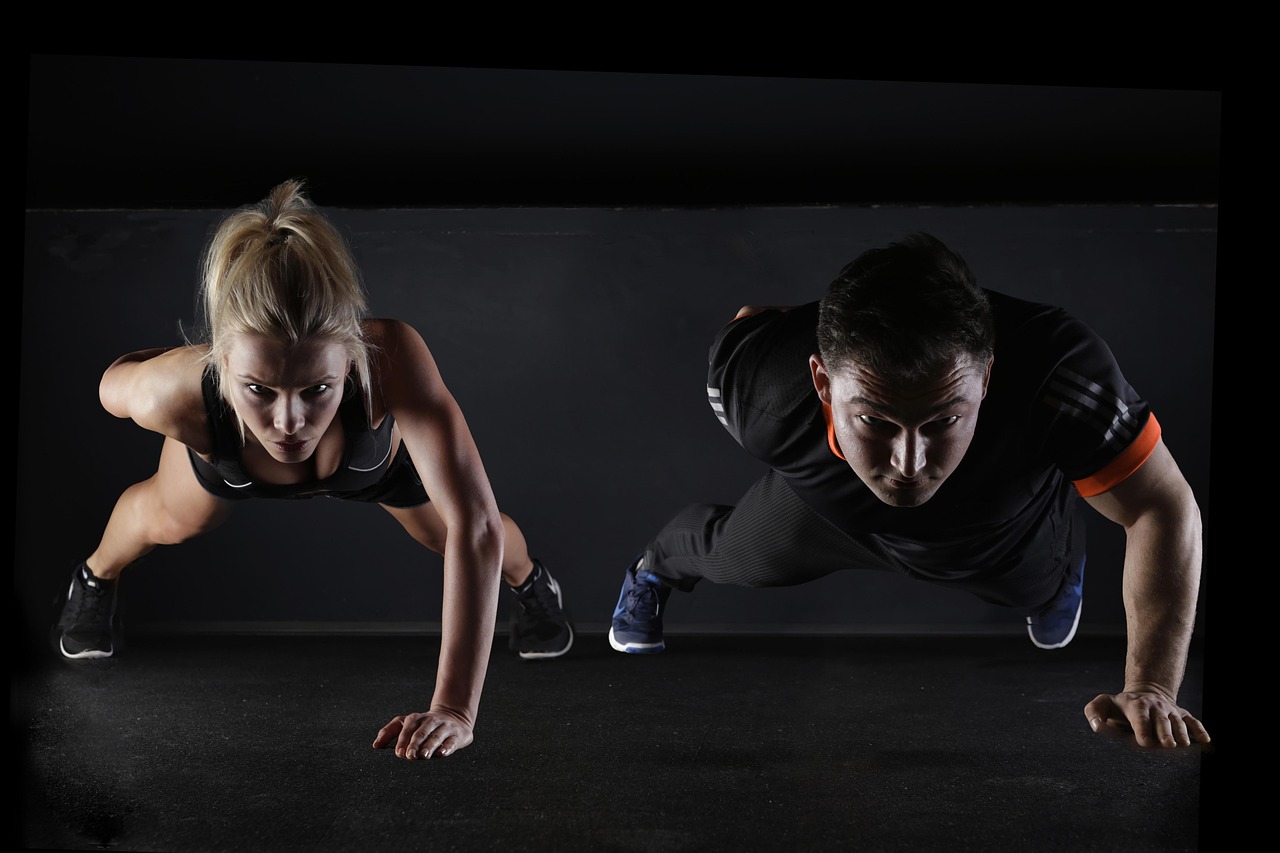 Man, woman, push-ups — Discover Full Spectrum Hemp in San Antonio with Trusted Products for Holistic Benefits