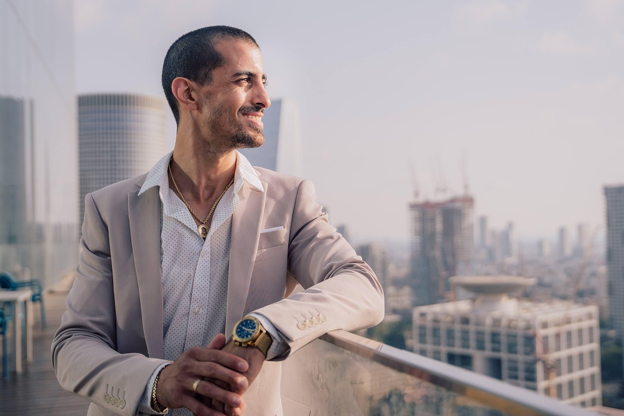 Man, suit, success — Exploring the Benefits and Procedures of Breast Augmentation in Bellevue