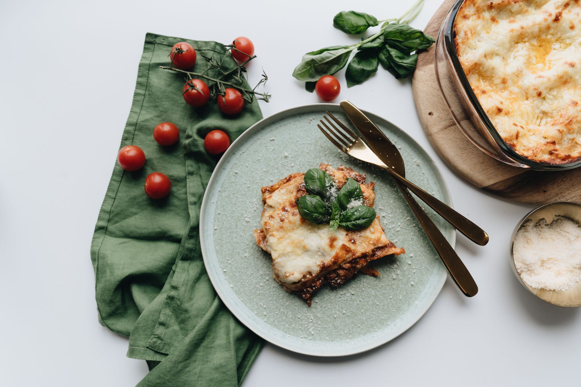 Savor the rich flavors of homemade Italian lasagna with fresh basil and tomatoes. — Potato Perfection: Oven-Baking Techniques