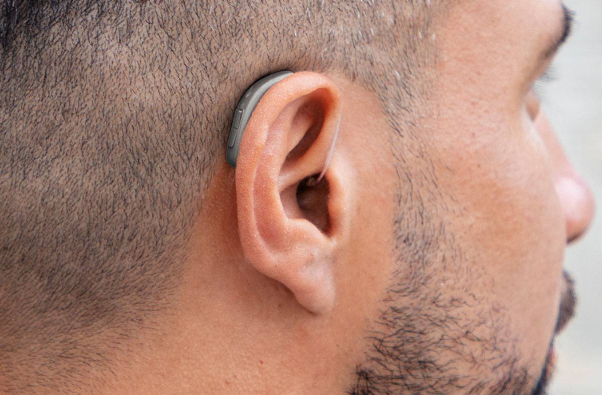 What does a hearing aid imply?